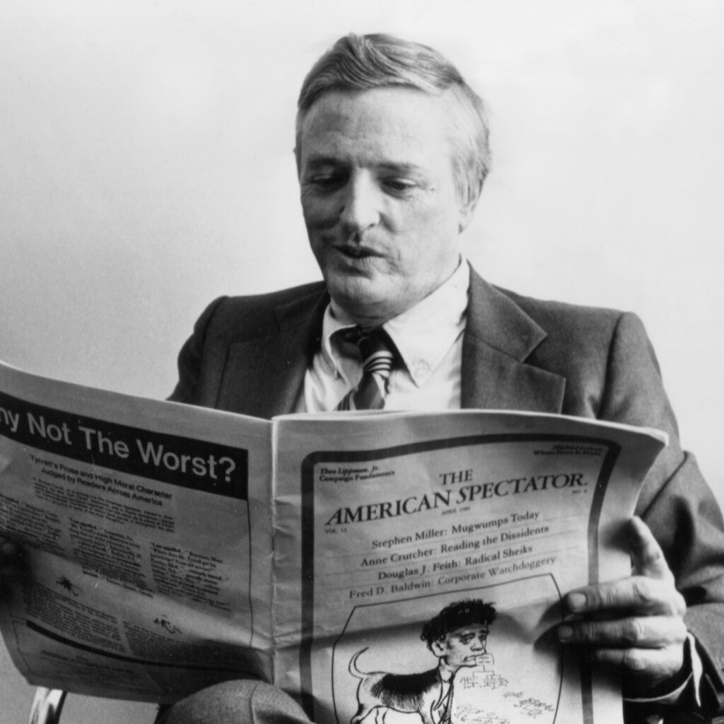 a man in a suit reading a newspaper
